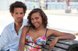 Couple sat on a bench