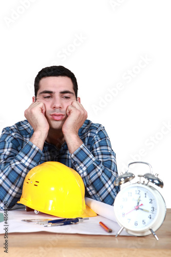 Photo: Architect with an alarm clock Architect with an alarm clock