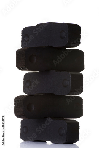 Photo: Lignite coal briquette Lignite coal briquette