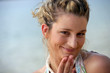 Shy blond at the beach