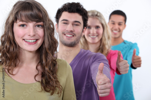 Photo: People giving the thumbs-up People giving the thumbs-up