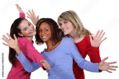 Photo: Three friends posing. Three friends posing.