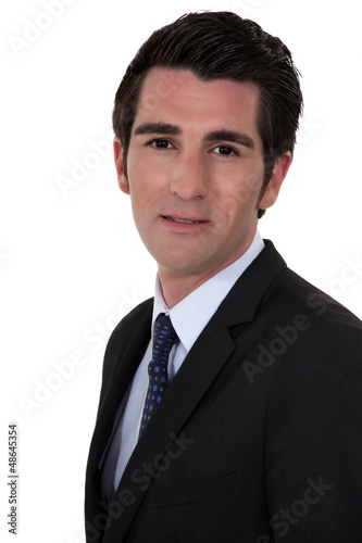 Photo: A portrait of a businessman. A portrait of a businessman.