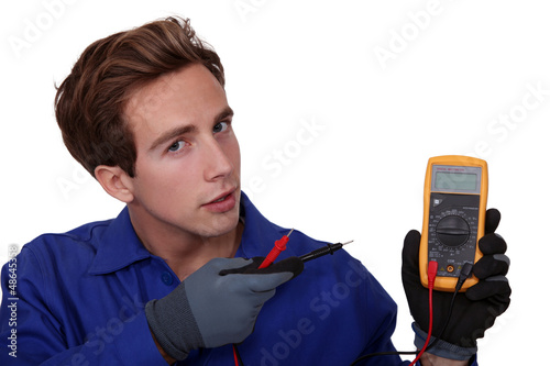 Photo: Electrician with meter reader Electrician with meter reader