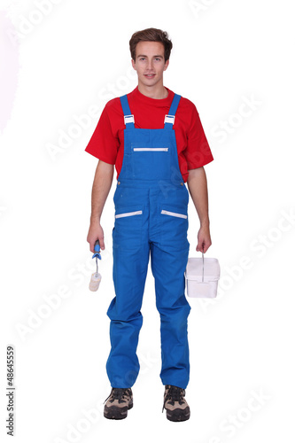 Photo: Decorator with roller and paint Decorator with roller and paint