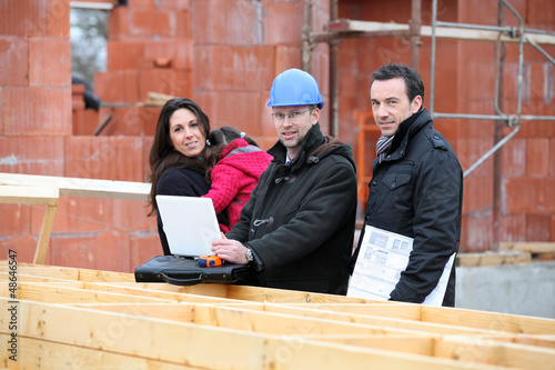 Photo: Architect and clients visiting site Architect and clients visiting site