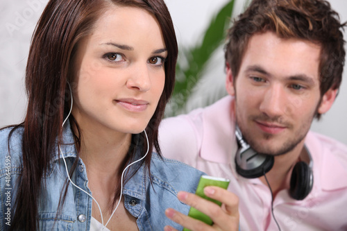 Photo: Woman listening to a music Woman listening to a music