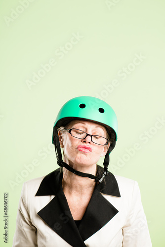 Photo: funny woman wearing cycling helmet portrait pink background real funny woman wearing cycling helmet portrait pink background real