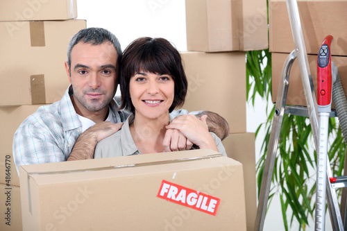 Photo: Couple moving into a new home Couple moving into a new home
