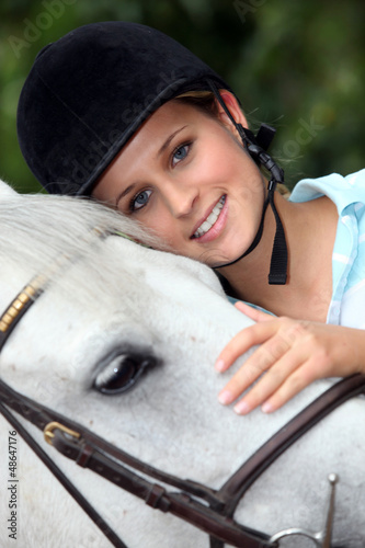Photo: A portrait of a woman and her horse. A portrait of a woman and her horse.