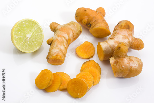 Photo: farm fresh sliced turmeric with lemon for flavor farm fresh sliced turmeric with lemon for flavor