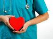 Photo: doctor holding a heart symbol doctor holding a heart symbol