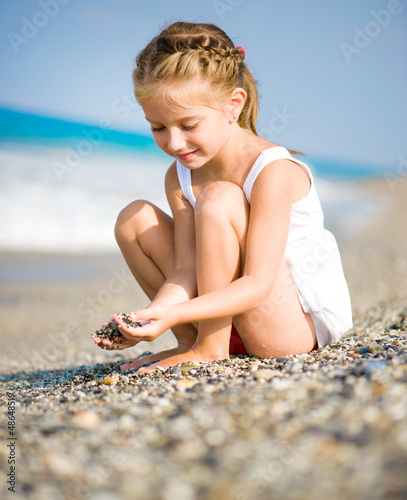 Photo: little girl on the beach little girl on the beach