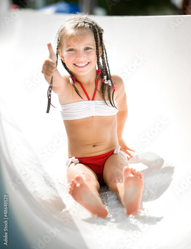 Photo: Little girl at aquapark Little girl at aquapark