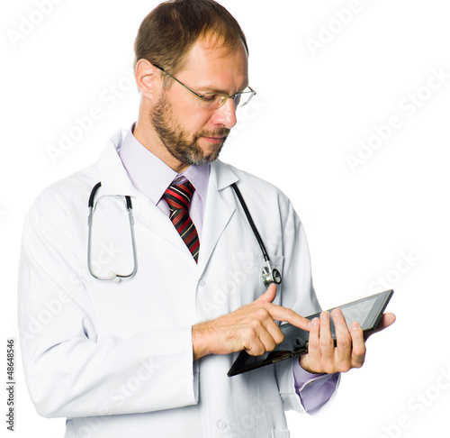 Photo: medical doctor holding a tablet pc medical doctor holding a tablet pc