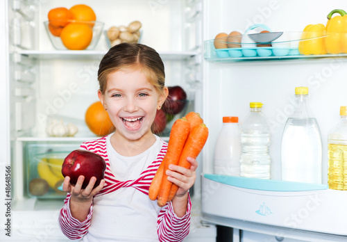 Photo: girl with carrots girl with carrots