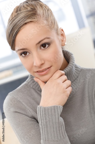 Photo: Closeup portrait of young woman Closeup portrait of young woman