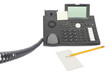 business phone with memo and pencil