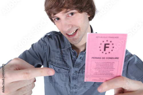 Photo: boy with driving license boy with driving license