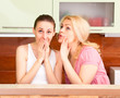 Photo: friends talking in the kitchen friends talking in the kitchen