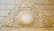"moon" stone at the entrance to the buddhist temple