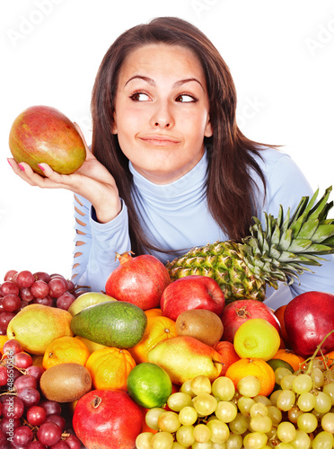 Photo: Girl with group of fruit and vegetables. Girl with group of fruit and vegetables.