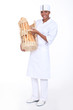 A baker showing off her bread