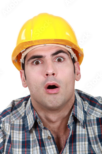 Photo: An astonished tradesman An astonished tradesman