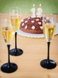 Photo: Chocolate Birthday Cake with lit candles Chocolate Birthday Cake with lit candles