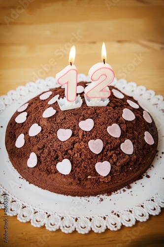 Photo: Chocolate Birthday Cake with lit candles Chocolate Birthday Cake with lit candles