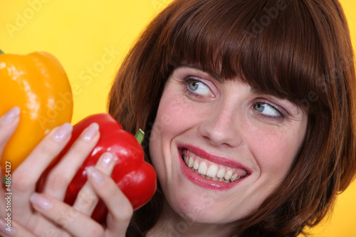 Photo: Woman with peppers Woman with peppers