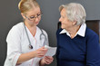 Elderly woman and a young doctor.