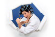 Woman in rollers with hairdressing scissors