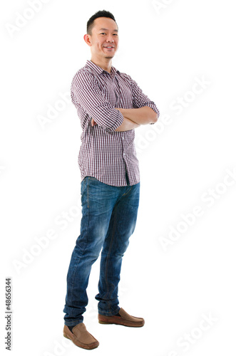 Photo: Confident full body Asian man Confident full body Asian man