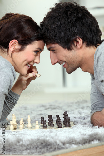 Photo: Couple playing chess Couple playing chess