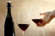 toasting with red wine