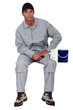 Painter sitting with hand roller