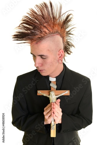 Photo: Happy young priest Happy young priest