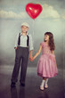 Children walk with a balloon