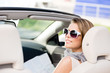 Girl checks the way with the help of the highway map