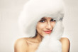 Fashion portrait of young beautiful woman posing on white backgr
