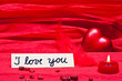 roter hintergrund mit herz und kerze