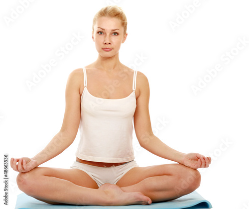 Photo: Young woman doing yoga Young woman doing yoga