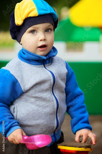 Photo: Boy Playing in Sandbox Boy Playing in Sandbox