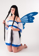 Attractive girl as fairy with wings