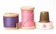 Old thimble and needles with thread