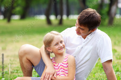Photo: Father and daughter in the park Father and daughter in the park