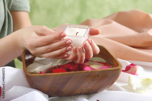Photo: Female hands and manicure related objects Female hands and manicure related objects