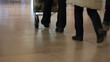 People shopping and walking inside supermarket