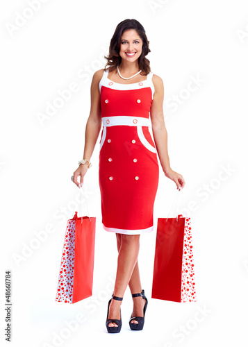 Photo: Beautiful woman with a shopping bags. Beautiful woman with a shopping bags.